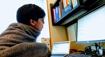 at my desk during my PhD oindree banerjee how to phd blog how much do graduate students get paid as stipend?