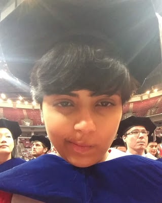 oindree banerjee at phd graduation pic for blog how to phd should I stay longer and make sure the paper gets published